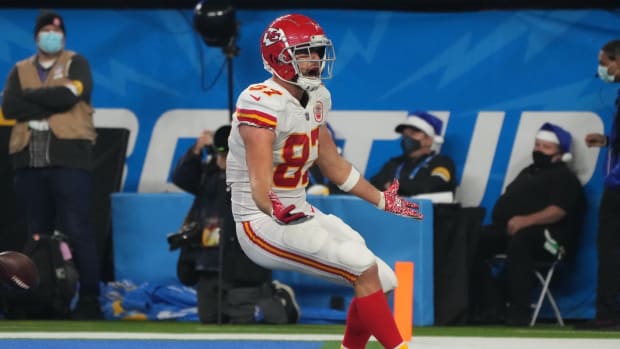 Dec 16, 2021; Inglewood, California, USA; Kansas City Chiefs tight end Travis Kelce (87) celebrates after scoring a touchdown in overtime against the Los Angeles Chargers at SoFi Stadium. Mandatory Credit: Kirby Lee-USA TODAY Sports